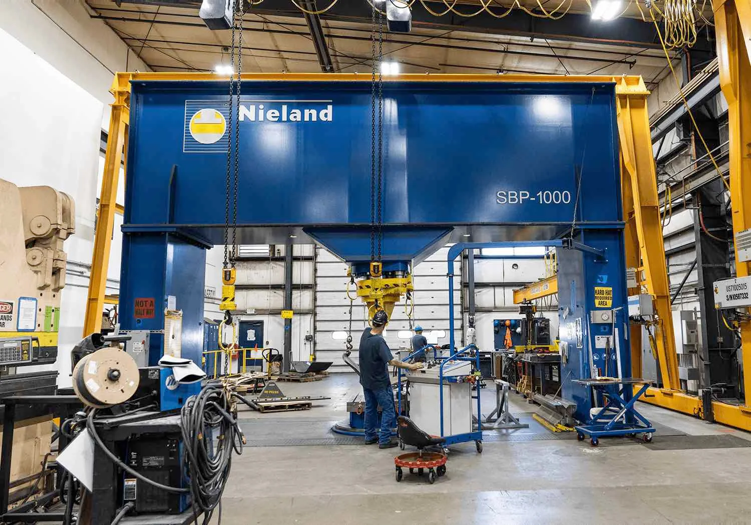 Giant break press in Janicki manufacturing building